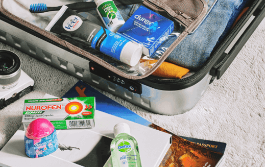 Reckitt products spilling out of a suitcase